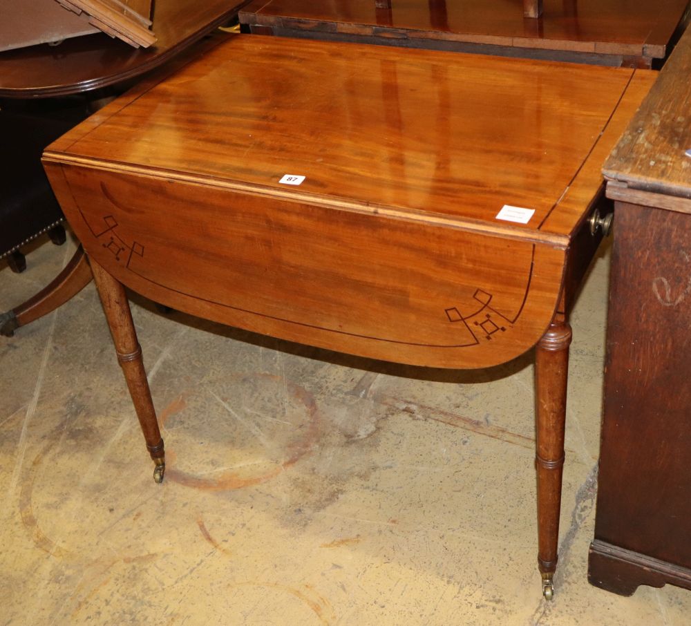 A Regency mahogany and ebony line inlaid Pembroke table, W.82cm